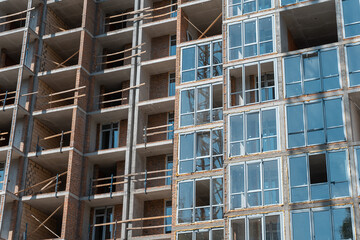 construction of new modern skyscraper or living building in big city