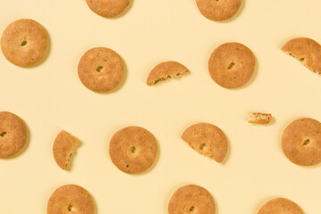 Group of tasty cookies or biscuit on yellow background.