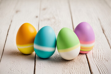 Beautiful colorful easter eggs on white wooden background