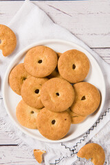 crispy  round biscuits. Sweet cookies on wooden table.