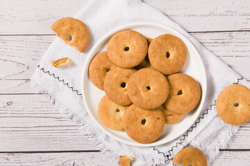 crispy  round biscuits. Sweet cookies on wooden table.