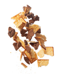 Mixed Cracker Butter Cookie Chocolate chip fall fly in mid air, cookie cracker floating. Mixed Cracker Butter Cookie Chocolate chip crack crunch throw in air. White background isolated freeze motion