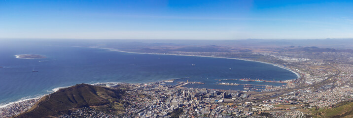 Naklejka premium A panoramic view of Cape Town, South Africa and the Atlantic Ocean as seen from Table Mountain National Park at the Platteklip Gorge Hiking Trail.