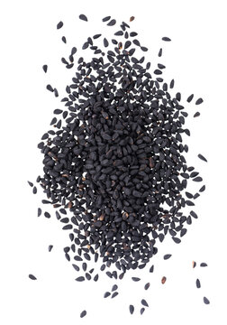 Black cumin seeds isolated on white background. Heap of black nigella seeds. Nigella sativa. Top view.