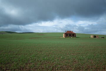 Fototapeta na wymiar landscape with an abandoned house