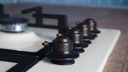 Modern gas cooktop in kitchen, closeup. Cooking appliance