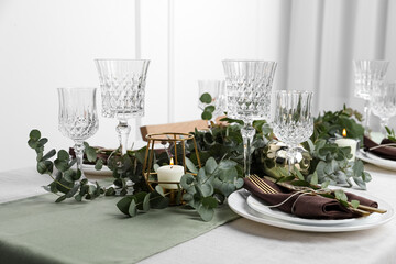 Stylish elegant table setting for festive dinner indoors