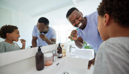 Smile, brushing teeth and father with son in bathroom for dental, morning routine and cleaning. Teaching, self care and toothbrush with black man and child at home for family wellness and hygiene