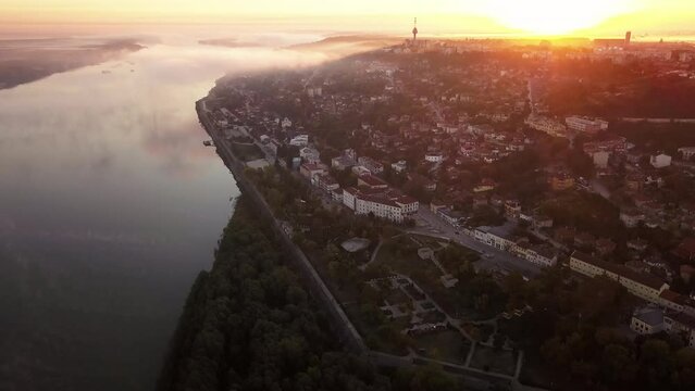 Coastal Town Of Ruse On Danube Riverbank During Dusk In Bulgaria. Aerial Shot