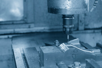 The CNC milling machine cutting injection mold part by solid ball end mill tool.