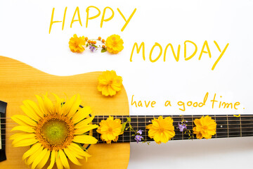 happy monday have a good time message card handwriting with yellow flower and guitar arrangement...