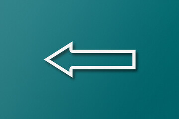 white paper arrow isolated on green paper background