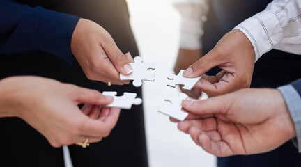 Team, hands and puzzle for teamwork, solution and integration, synergy and collaboration. Hand,...