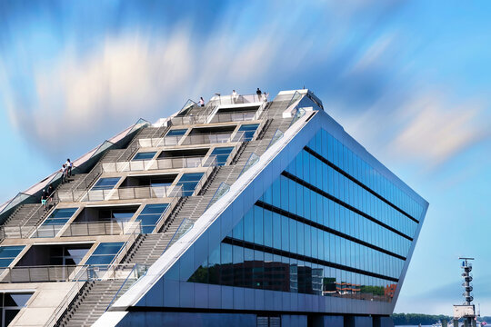Dockland office building at Dockland Ferry Wharf (Fischereihafen). A large trapezoid building featuring an observation deck