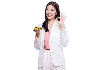 Happy young Asian business look woman shows yellow mock up car with OK hand sign isolated on...