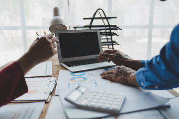 Group of business people, investors analyzing financial reports from documents to calculate income,...