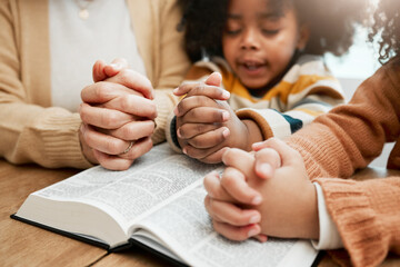 Bible, hands or mom praying with children siblings for prayer, support or hope together in...