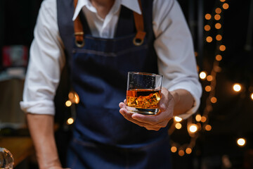 Bartender Serve Whiskey, on wood bar, 