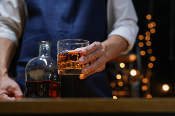 Bartender Serve Whiskey, on wood bar, 