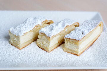 New York cheesecake on white wooden table - homemade cooking bakery concept. High quality photo