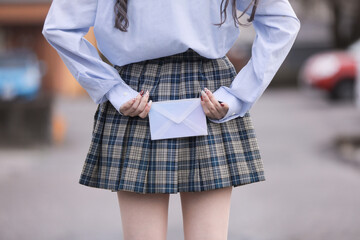 Fototapeta na wymiar 制服を着た女子高生　high school girl