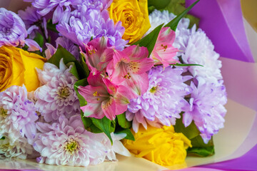 Naklejka na ściany i meble Multicolored flowers.Beautiful spring bouquet close-up. Flowers close-up.