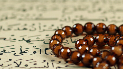 Quran the holy book of muslim religion and Pray Counting Bead