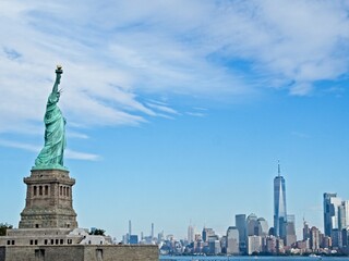 The Statue of Liberty sits on Liberty Island in the New York Harbor. It was once a beacon of hope for immigrants arriving by steamship into the United States