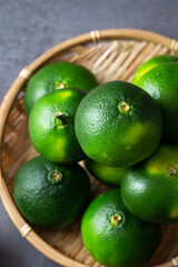 Fresh tangerines on gray background	