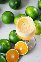 Fresh tangerines and tangerine juice