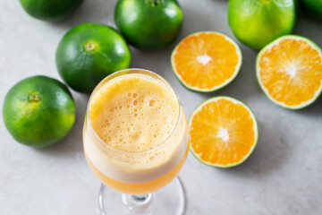 Fresh tangerines and tangerine juice