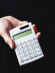 calculator in hand