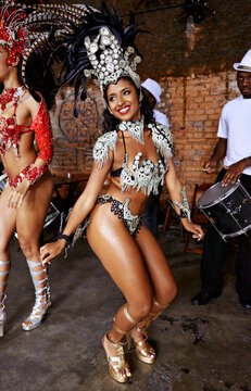 Keeping on their toes. a beautiful samba dancers performing in a carnival.
