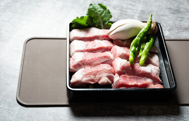  fresh pork cheek meat and peppers and vegetables