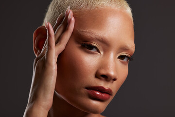 Beauty, makeup and lipstick, portrait of black woman in dark studio with platinum hair isolated on...