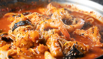 steamed monkfish smothered in spicy sauce