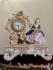 antique clock with gilt in baroque style