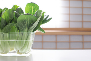 Bok choy in the glass container