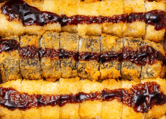 Baked Japanese rolls as background.