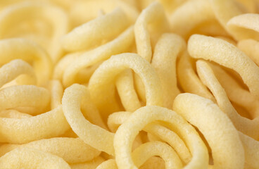 Onion ring chips as a background.