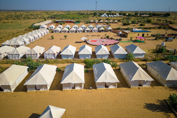 Typical desert camp conducts desert safari tours in Rajasthan, India.
