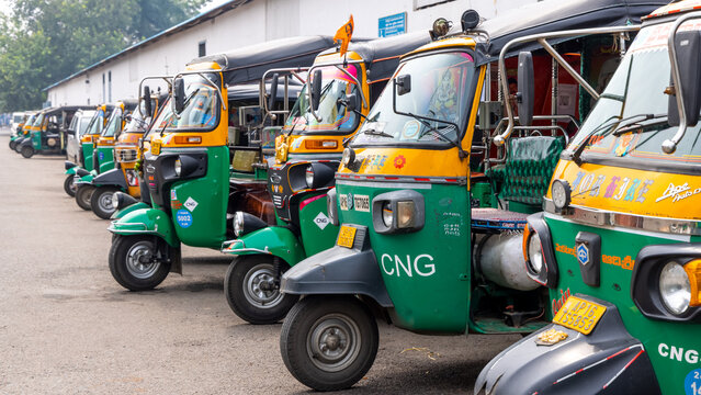 Many CNG based auto rikshaws at taxi stand, Share auto rickshaw is a common and most economical commute in Vijayawada, India.