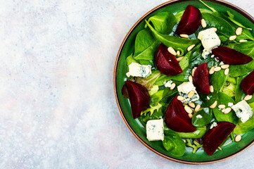 Vegetable salad with beets, cheese and herbs.