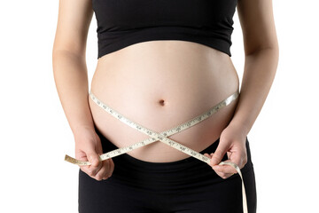 A pregnant woman is measuring her belly circumference with a tape measure (isolated on white background)