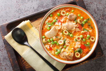 Asopao de Pollo this comforting Puerto Rican chicken and rice gumbo dish is loved throughout the...