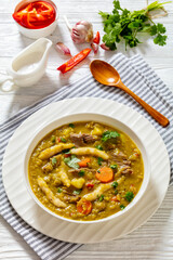gungo peas soup with dumplings, veggies and beef