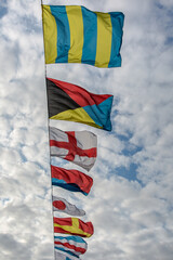 International maritime signal flags. Signal flags are displayed on the bridge over the Neva River during the Naval parade in St. Petersburg