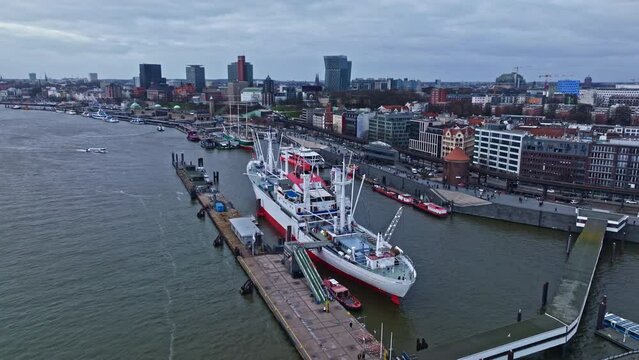 Drone shot revealing General cargo carrier and museum ship Cap San Diego on the Elbe near Wedel , Hamburg , Germany .