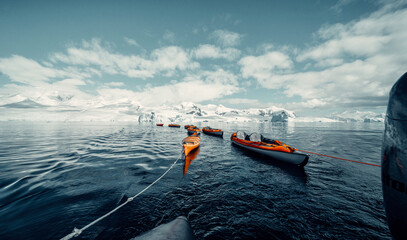 Kayaks Being Pulled By Zodiac Boat in Antarctica 2
