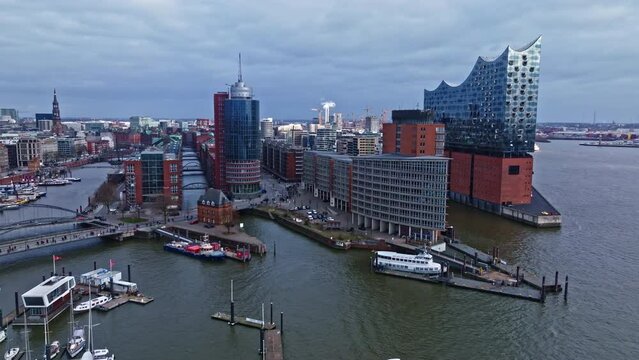 Drone shot revealing Elbphilharmonie (concert hall) , German harbor Hafen city , Elbe River , Hamburg , Germany